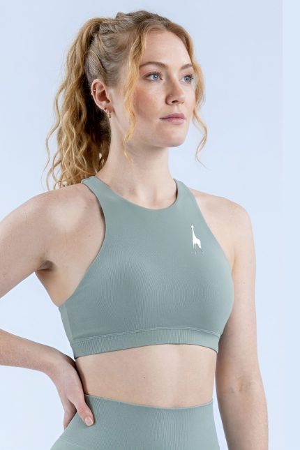 Vista delantera del top deportivo Electric Sage para mujer de Girafe Canarias