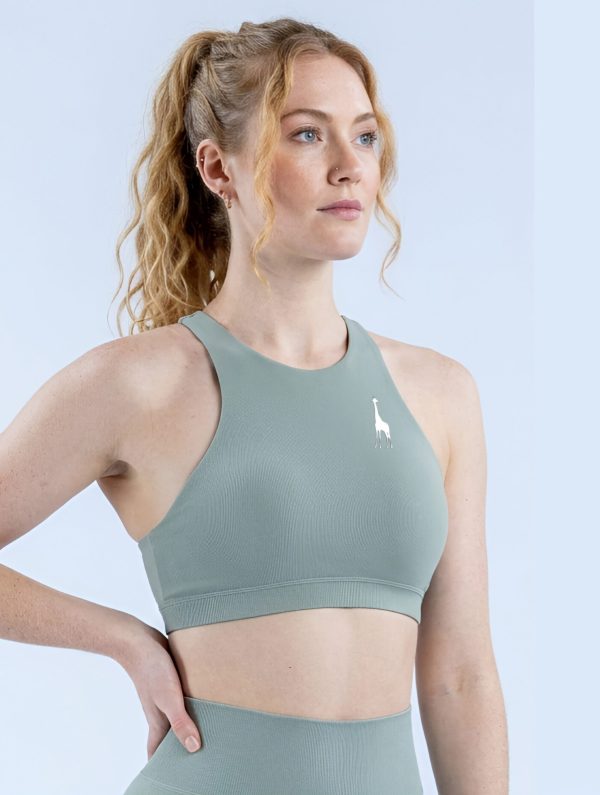 Vista delantera del top deportivo Electric Sage para mujer de Girafe Canarias
